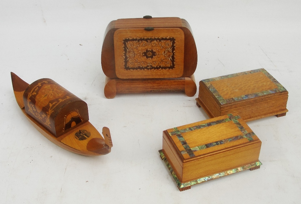 Two Paua inlaid trinket boxes, a cigarette box in the form of a gondola and a further cigarette box.