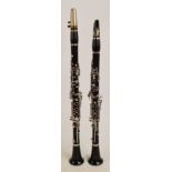A matched pair of Boosey & Hawkes symphony 1010 clarinet. CONDITION REPORT: Condition good.