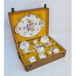 A cased 19th century Berlin porcelain hand painted floral decorated coffee set comprising tray,