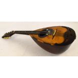 A late 19th/early 20th century Sicilian bowl back mandolin by Mario Casella, Catania, cased.