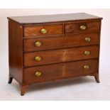 A George III mahogany chest of two short and three long graduated drawers on splayed bracket feet,