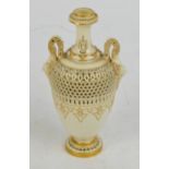 A rare Royal Worcester reticulated vase attributed to George Owen, the bead decorated neck above