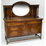 An early 20th century oak mirror back sideboard with low raised back. CONDITION REPORT: Width 168cm,