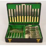 A canteen of Victorian hallmarked silver flatware in fiddle and thread pattern with crested finials