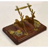 A late Victorian mahogany and brass mounted inkstand,