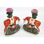 A pair of large Victorian Staffordshire spill vases, each with cow and calf, height 27.5cm.