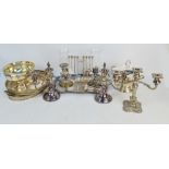 A quantity of silver plate including a pair of candelabra, a candelabrum, a pair of stormlights,