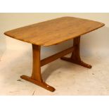An Ercol light elm refectory table with rounded rectangular top, top 151 x 73cm. CONDITION REPORT: