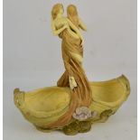 A Royal Dux style Art Nouveau figural bowl depicting two scantily clad entwined maidens above a