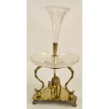 A late 19th/early 20th century electroplated centrepiece on shaped trilobed base with cast figure of