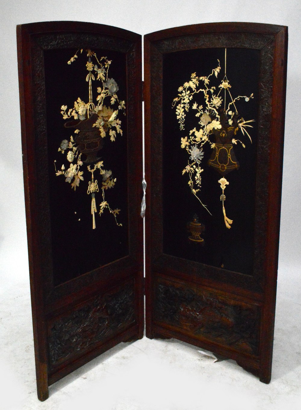 A large Japanese Meiji period two fold Shibayama style inlaid screen,