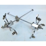 A pair of chrome Art Deco three branch ceiling lights, lacking shades, length of drop 81cm.