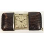 MOVADO; a 1940s self winding purse watch, the circular dial set with Arabic numerals and
