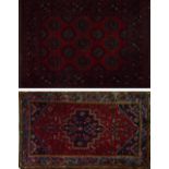 A Tekke Bokhara rug with central red ground field set with elephant foot medallions, 155 x 110cm,