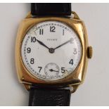 ROLEX; a gentleman's vintage 9ct gold cased wristwatch, the circular white enamel dial set with