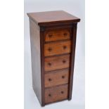A late Victorian walnut Wellington chest with five drawers and side locking arm, lacking base,