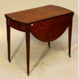 An unusual 19th century satinwood Pembroke table.