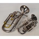 A silver plated Besson 600 cornet and a larger Boosey & Hawkes "Regent", both cased.
