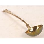 An early Victorian hallmarked silver ladle with oval bowl and engraved initials to the handle,