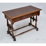 A late Victorian oak two drawer desk/side table raised on turned and block supports united by