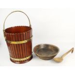 A mahogany and brassbound pail, with coopered effect to the outside and with swing handle,