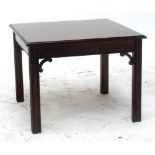 A burr walnut square section coffee table raised on fluted legs, width 61cm.