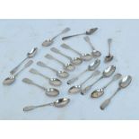 A set of nine William IV hallmarked silver fiddle pattern teaspoons,