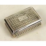 A George IV hallmarked silver vinaigrette of rectangular form with engine turned decoration,