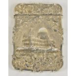 NATHANIEL MILLS; a Victorian hallmarked silver castle top card case of shaped rectangular form,