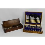 An oak cased canteen of plated cutlery,