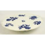 A Minton blue and white floral decorated lazy Susan with shaped spinning top and spreading