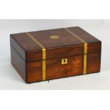 A Victorian rosewood and brass bound lidded box. CONDITION REPORT: No key. Spliced repair to back of