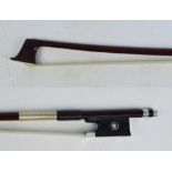 A 20th century silver mounted violin bow with octagonal shaft, possibly English.