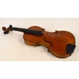 A three-quarter size German violin with two-piece back, Stradivarius copy, length of back 34.5cm.