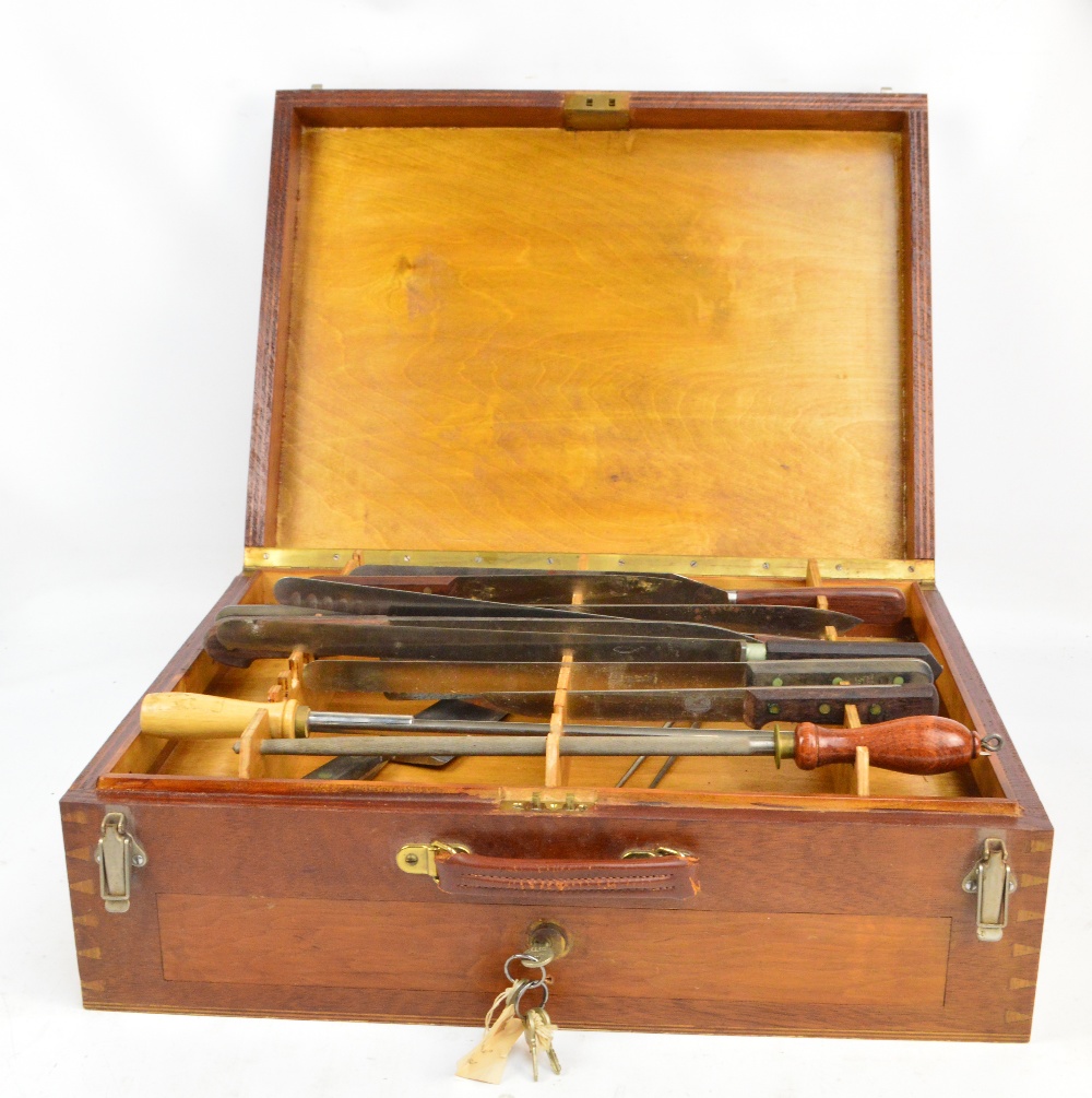 A vintage cased set of chef's knives and utensils,