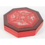 A 20th century Chinese octagonal lacquer food box with mother of pearl inlaid top depicting cranes