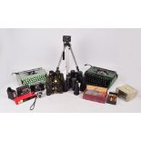 A small collection of camera items including a Dixons Disc Sharp Shooter camera, a Hanimex camera,