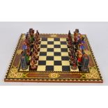 A modern boxed "Battle of Hastings" chess set produced by Studio Ann Carlton,
