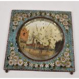 A 19th century Italian micromosaic frame with daisy decoration on pale blue ground around a