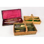 A cased five piece antler handled carving set with silver collars, a miniature cutlery set,