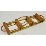 An Art Deco oak and brass mirrored rectangular three section decanter tray, probably French,