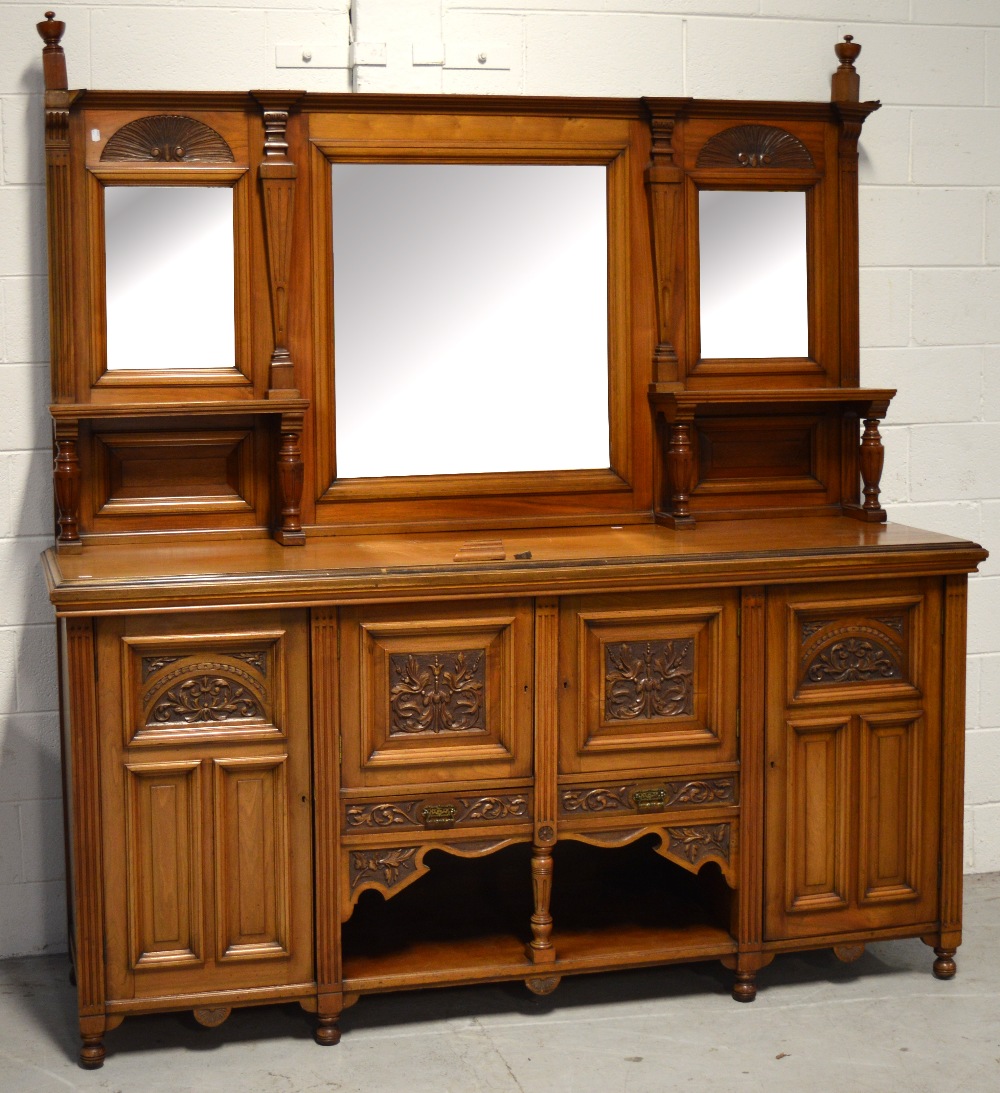 An early 20th century walnut mirror back sideboard,