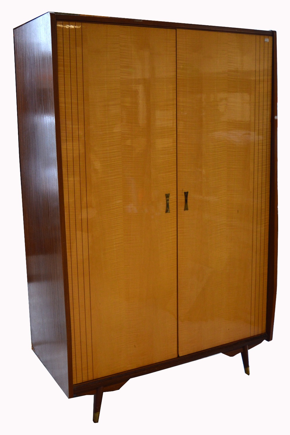 A retro 1960s twin door gentlemans wardrobe on tapering block supports with integral section for