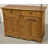 An early to mid 20th century Arts and Crafts style sideboard,