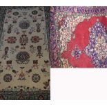 A red ground Turkish rug, approx 270 x 160cm and a beige ground rug, approx 190 x 120cm (2).