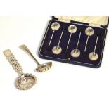 A cased set of six George V hallmarked silver coffee bean finial teaspoons, Birmingham 1931,