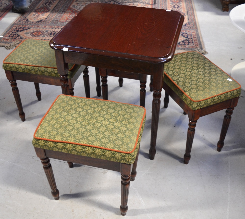 A 20th century small mahogany square side table on fluted legs,