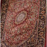 A red ground Keshan style runner, 210 x 70cm.