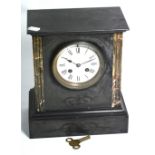 A 19th century French slate mantel clock, the dial set with Roman numerals, height 27cm (af).