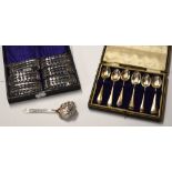 A cased set of five hallmarked teaspoons, a cased set of six hallmarked silver teaspoons,